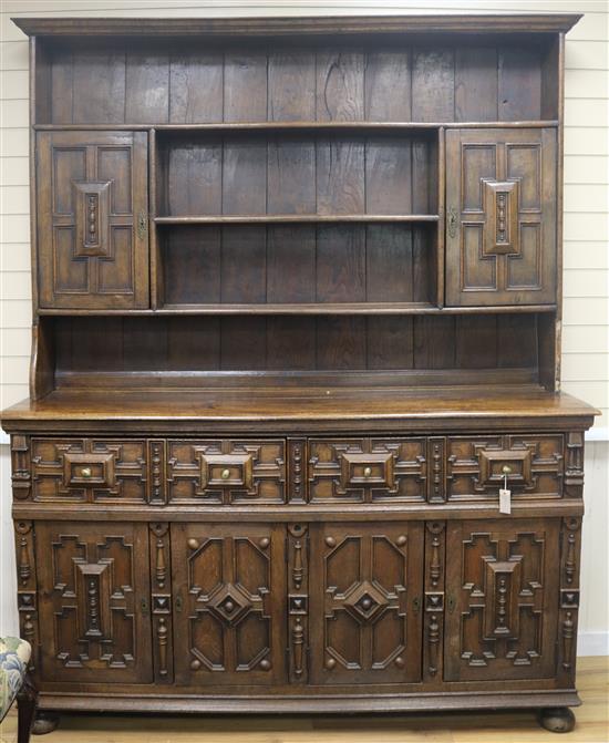 A 17th century style oak dresser, W.6ft D.1ft 8in. H.7ft 6in.